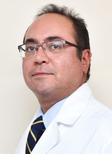 Dr. Carlos León Mejía